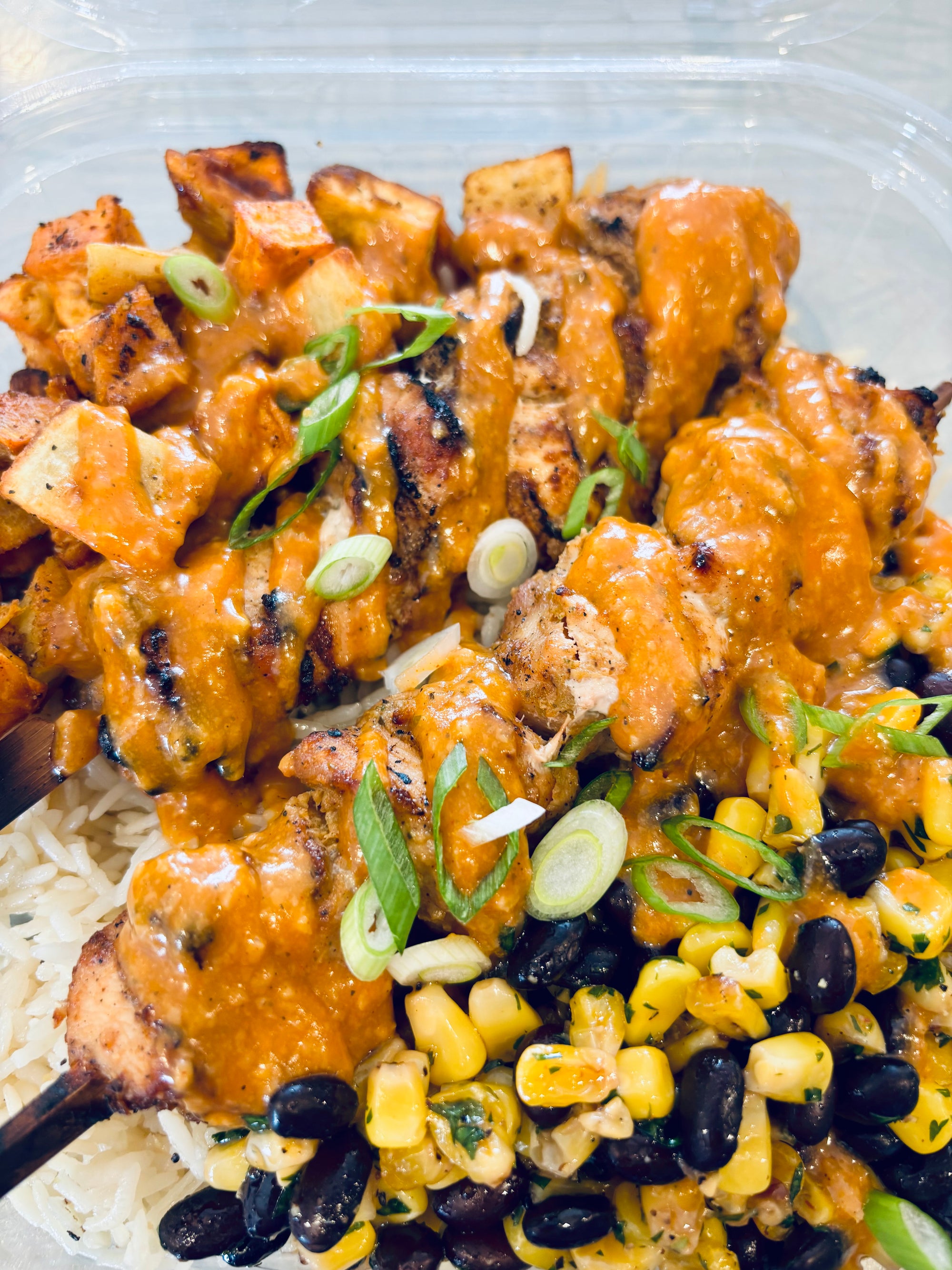 Grilled Peri Peri Chicken Skewers with Roasted Corn, Black Beans & Sweet Potato over Rice (Available Wed Jan 28th)